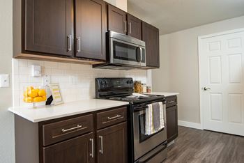 Espresso/white shaker cabinets*